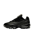 Plugmarket Nike x Supreme Air Max 95 Lux Black leather sneakers with visible air cushioning.