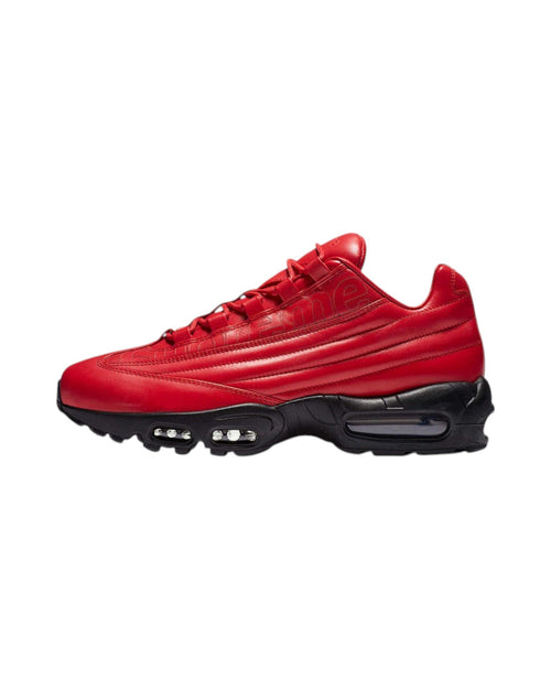 Plugmarket - Nike x Supreme Air Max 95 Lux Gym Red leather sneakers with black sole and visible air cushioning.