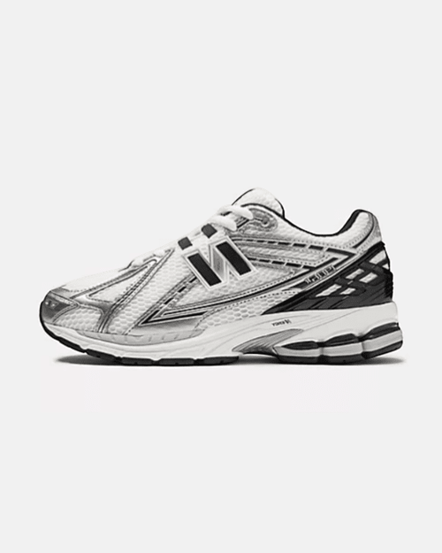 Plugmarket New Balance 1906r sneakers in black, white, and grey with mesh and synthetic overlays.